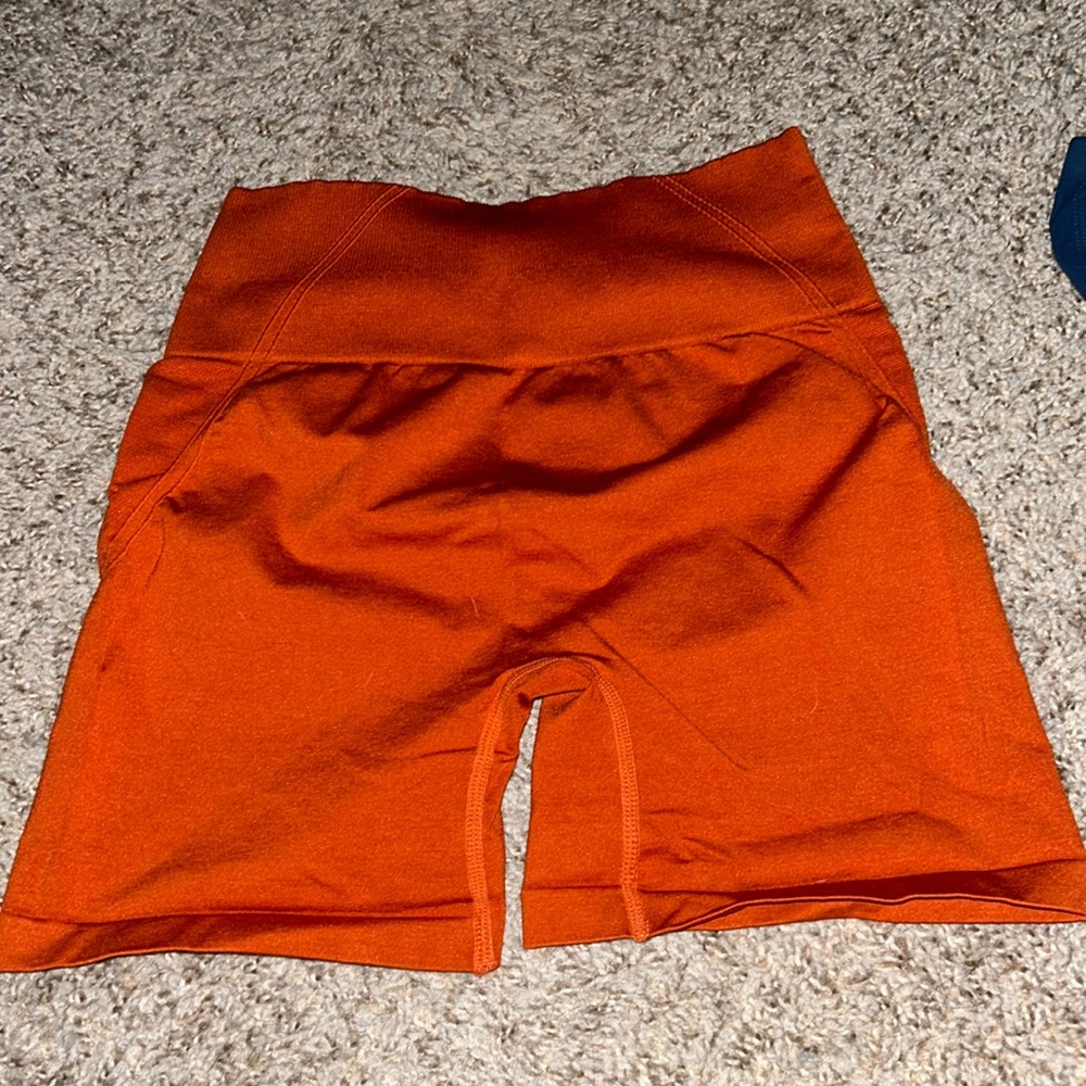 Orange scrunch contour workout shorts